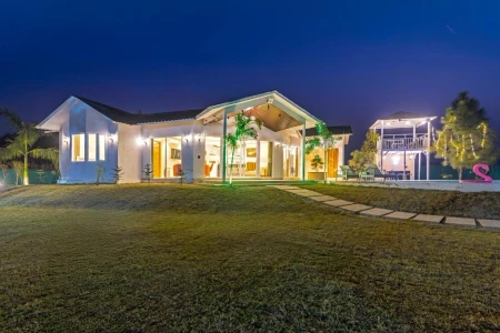 hotel in sector 135, noida for family - elivaas vedaaz 4 bhk farmhouse with pvt pool