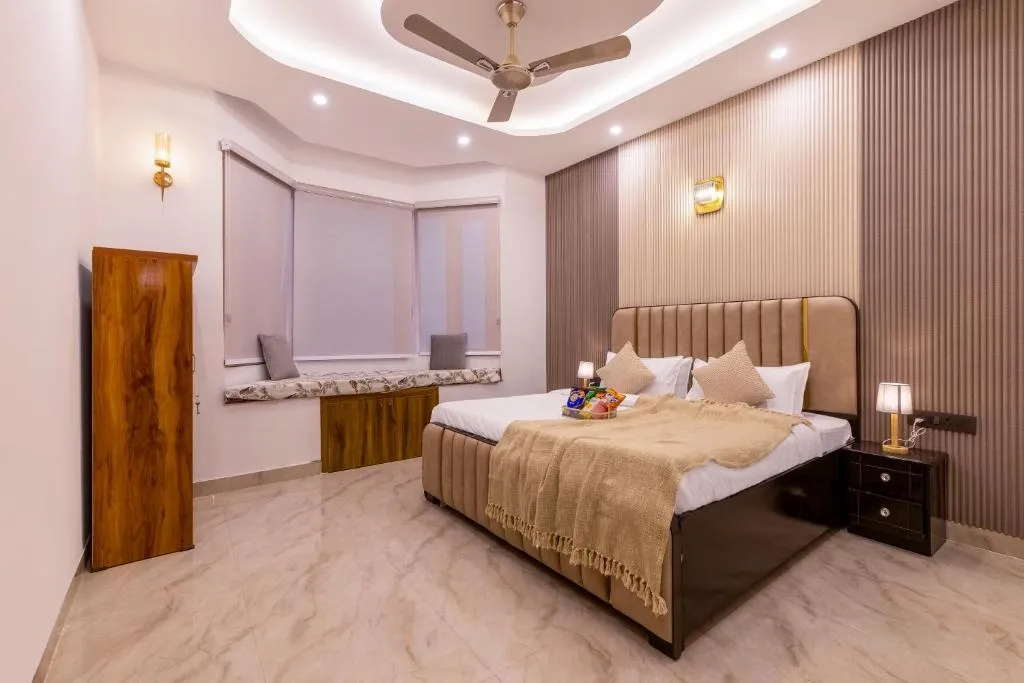 budget hotel in sector 135, noida - elivaas vedaaz 4 bhk farmhouse with pvt pool