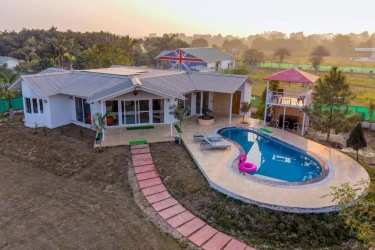 hotel in sector 135, noida for family - elivaas vedaaz 4 bhk farmhouse with pvt pool