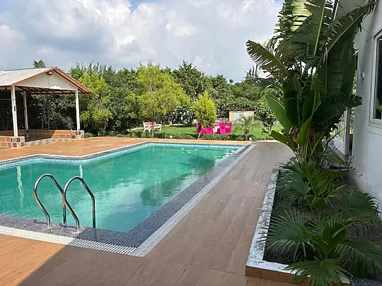 family hotel with pool in sector 150, noida - gobravo 16 3bhk farm with pool and garden