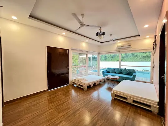 hotel with gym in sector 150, noida - gobravo 71 2bhk farm with pool and garden
