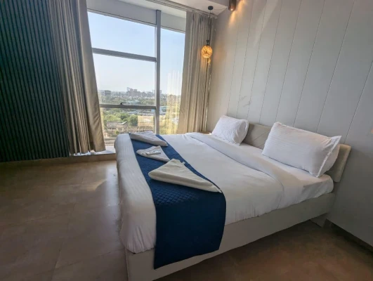 hotel room booking in sector 50, noida - nimantrana luxury suites