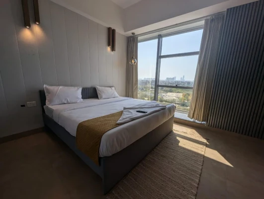 hotel near noida railway station - nimantrana luxury suites