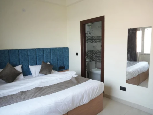 hotel with free parking in sector 82, noida - the raas guestline