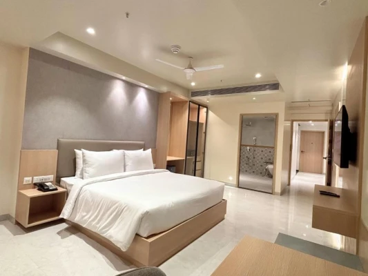 hotel with free parking in mundhwa, pune - samrat studios