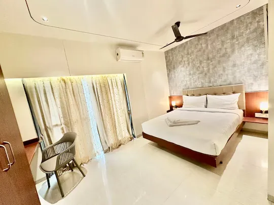 hotel with swimming pool in kharadi, pune - staybird  azure suites business hotel