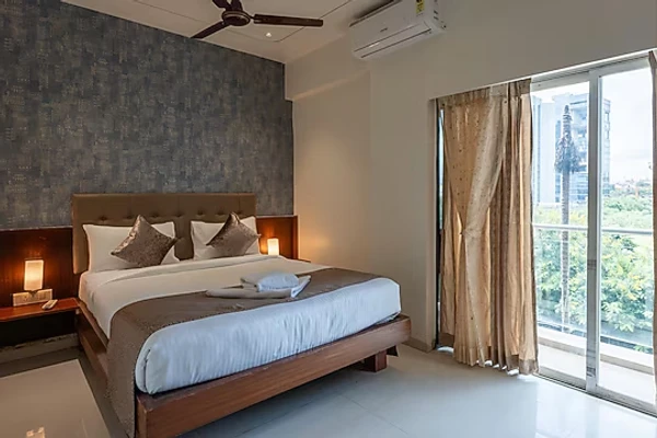 hotel with gym in kharadi, pune - staybird  azure suites business hotel