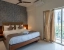 hotel in kharadi, pune for couples - staybird azure suites business hotel