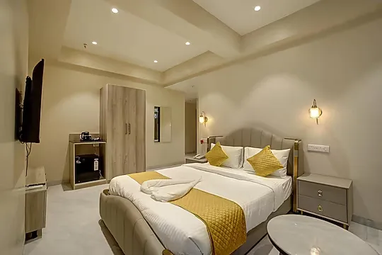 hotel with swimming pool in magarpatta city, pune - staybird capital business hotel