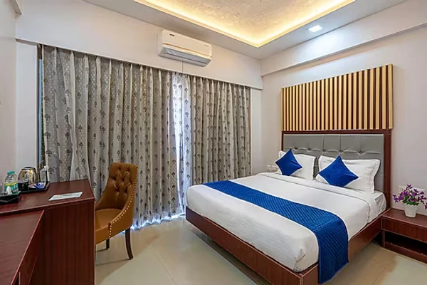 hotel with swimming pool in kharadi, pune - staybird divine suites business hotel