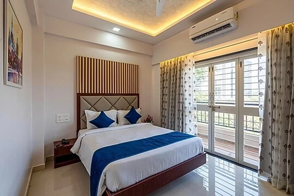 family hotel with pool in kharadi, pune - staybird divine suites business hotel