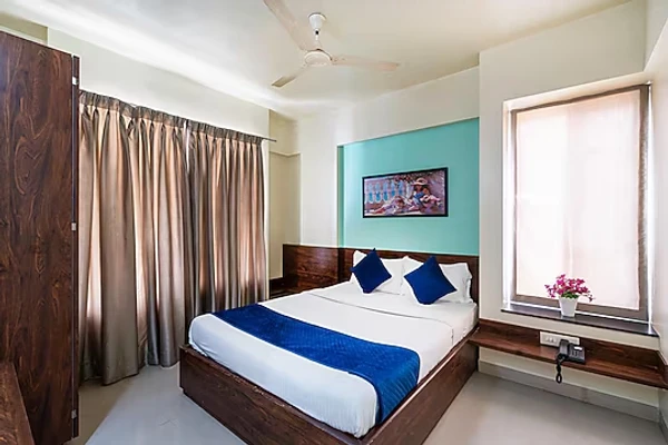 hotel near pune railway station - staybird icon bliss an apartment hotel