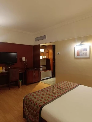 hotel in shivaji nagar, pune for family - pride premier pune