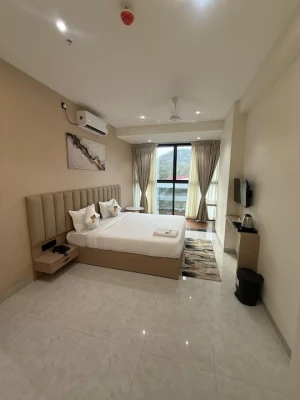 hotel with gym in pimpri chinchwad, pune - ttura kitchen bar rooftop & rooms