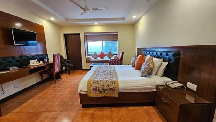 family hotel with pool in bhatrojkhan, ranikhet - ecko woodsvilla resort