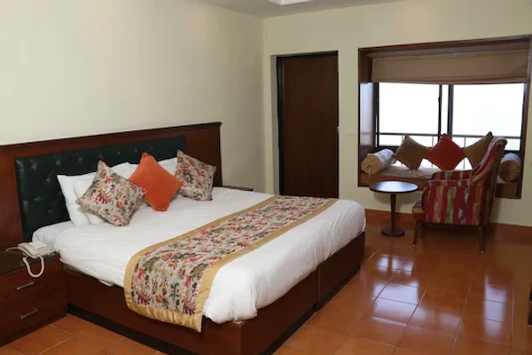 hotel with party hall in bhatrojkhan, ranikhet - ecko woodsvilla resort