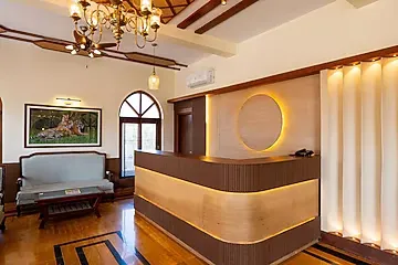 family hotel with pool in ranthambore road, sawai madhopur - elivaas tiger cave suite room with pool and garden