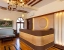 family hotel with pool in ranthambore road, sawai madhopur - elivaas tiger cave suite room with pool and garden