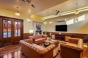 hotel with bar in ranthambore road, sawai madhopur - elivaas tiger cave suite room with pool and garden