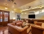 hotel with bar in ranthambore road, sawai madhopur - elivaas tiger cave suite room with pool and garden