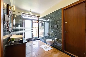 hotel with gym in ranthambore road, sawai madhopur - elivaas tiger cave suite room with pool and garden