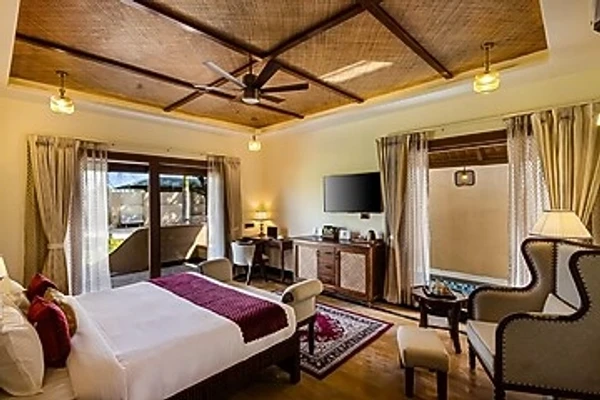 hotel with gym in ranthambore road, sawai madhopur - elivaas tiger cave suite room with pool and garden