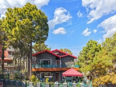 budget hotel in dharampur, solan - elivaas aaram bagh 4 bhk escape amid pine forest & valley view