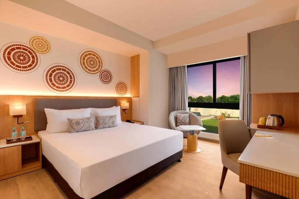 family hotel with pool in bypass road, somnath - lemon tree resort somnath