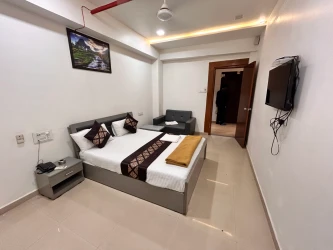 best corporate hotels in hotel nirali rooms - nexus hospitality surat