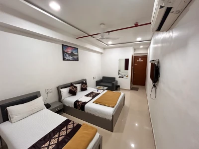 hotel near surat railway station - hotel nirali rooms - nexus hospitality