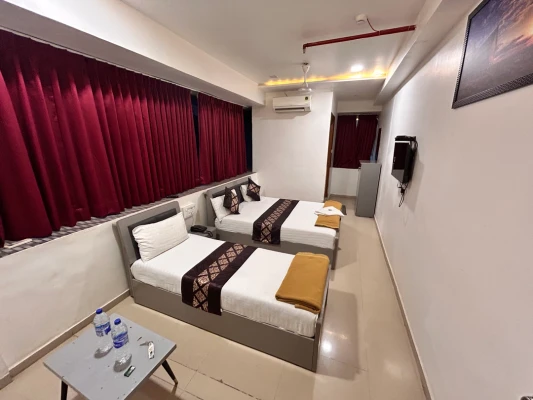 hourly hotels in hotel nirali rooms - nexus hospitality surat