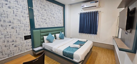 family hotel with pool in bhimrad, surat - hotel radiyesan gold