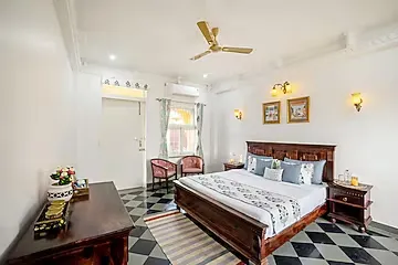 hotel with banquet hall in kundal ubeshwarji, udaipur - elivaas amber royale 3 bhk with pvt pool & terrace udaipur