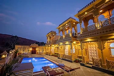 hotel with party hall in kundal ubeshwarji, udaipur - elivaas amber royale 3 bhk with pvt pool & terrace udaipur