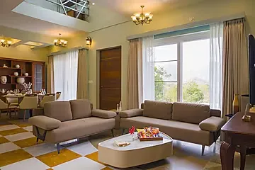 hotel in madar, udaipur for couples - elivaas festiva mansion 3 bhk villa with pvt pool & garden
