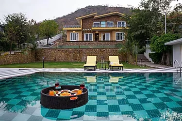 hotel with gym in madar, udaipur - elivaas festiva mansion 3 bhk villa with pvt pool & garden