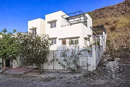 hotel with free parking in kaladwas, udaipur - elivaas shourya villa 3 bhk villa with swimming pool