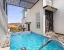 hotel with free parking in kaladwas, udaipur - elivaas shourya villa 3 bhk villa with swimming pool