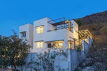 hotel with free parking in kaladwas, udaipur - elivaas shourya villa 3 bhk villa with swimming pool