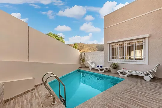 hotel with free parking in kaladwas, udaipur - elivaas shourya zenna luxe 3 bhk with private pool udaipur