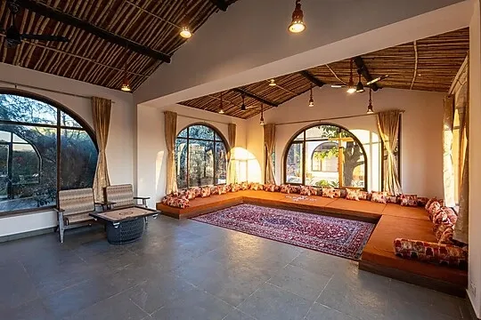 hotel with gym in kavita, udaipur - still river suites by elivaas with heated pool & jacuzzi udaipur