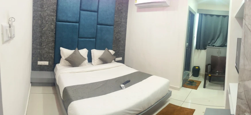 hotel with party hall in karelibaug, vadodara - hotel s s town