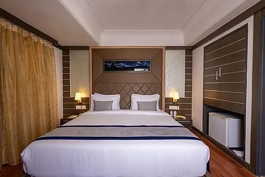 hotel with bar in sayajiganj, vadodara - pravasa stay vadodara