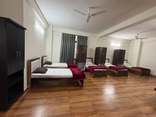 hotel with meeting room in buddh vihar, varanasi - aks grand
