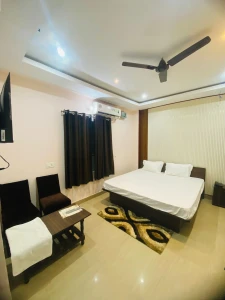 hotel with party hall in sundarpur, varanasi - arvi guest house