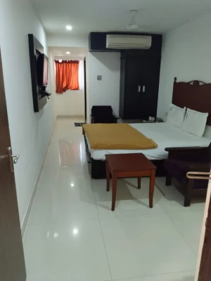 family hotel with pool in benz circle, vijayawada - hotel swagath inn