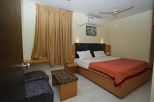 hotel with bar in labbipet, vijayawada - sri subhamasthu grand